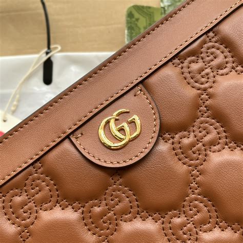 702200 gucci|GG Matelassé small bag .